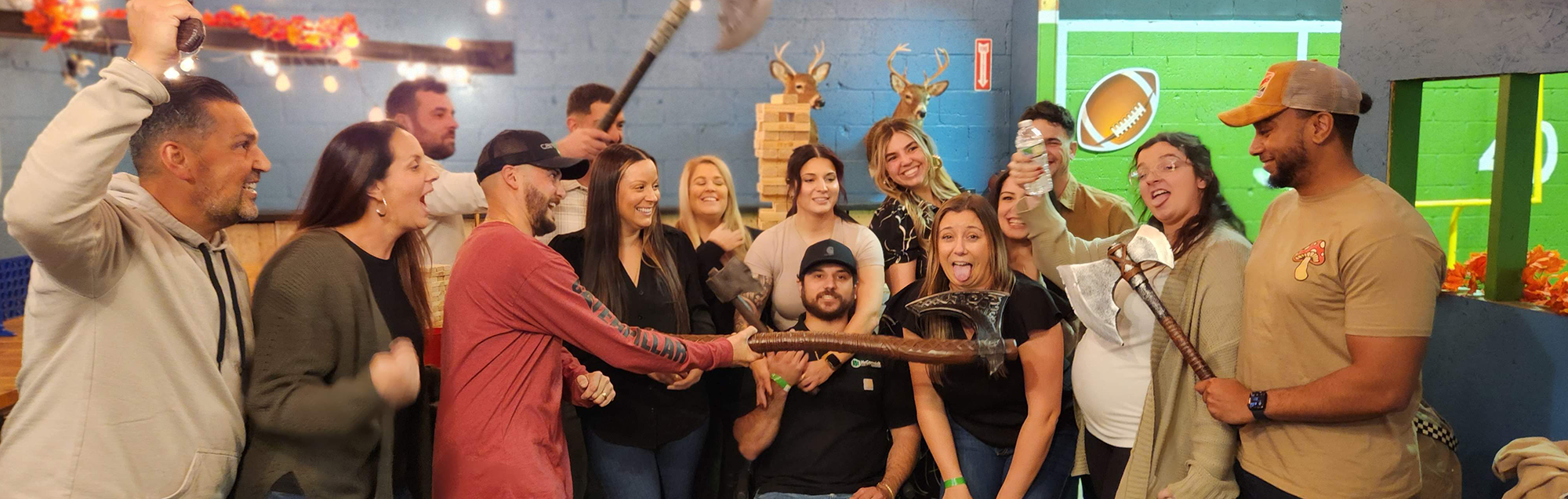 A party of axe throwers at the Agawam Axe House - an axe throwing bar located in Agawam MA