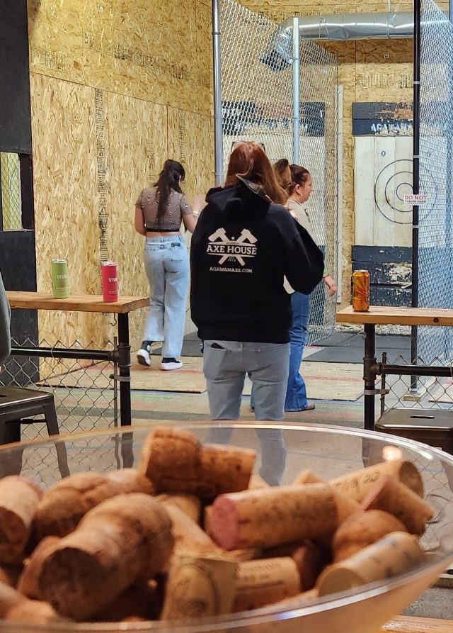 Agawam Axe House - interior shot of axe throwing from the Bar