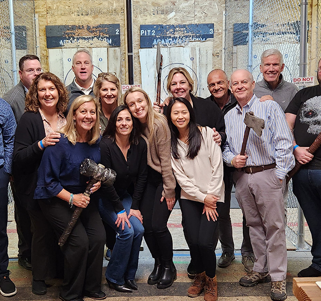 Axe Throwing Corporate Event at the Agawam Axe House - perfect for holiday parties, end of year events, holiday outtings, team building, sales meetings, and more